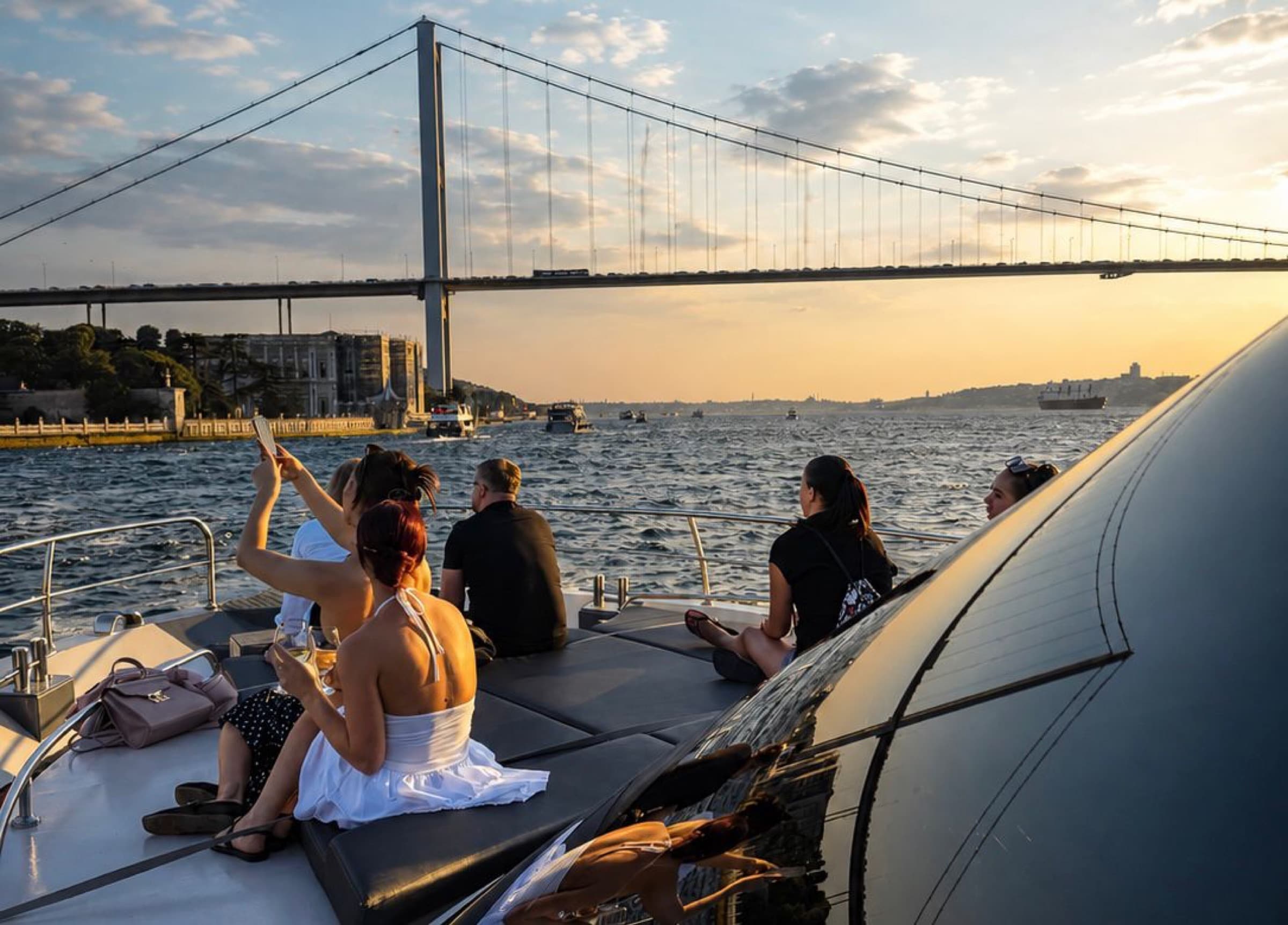 Guests photographing the bridge from the sunpad