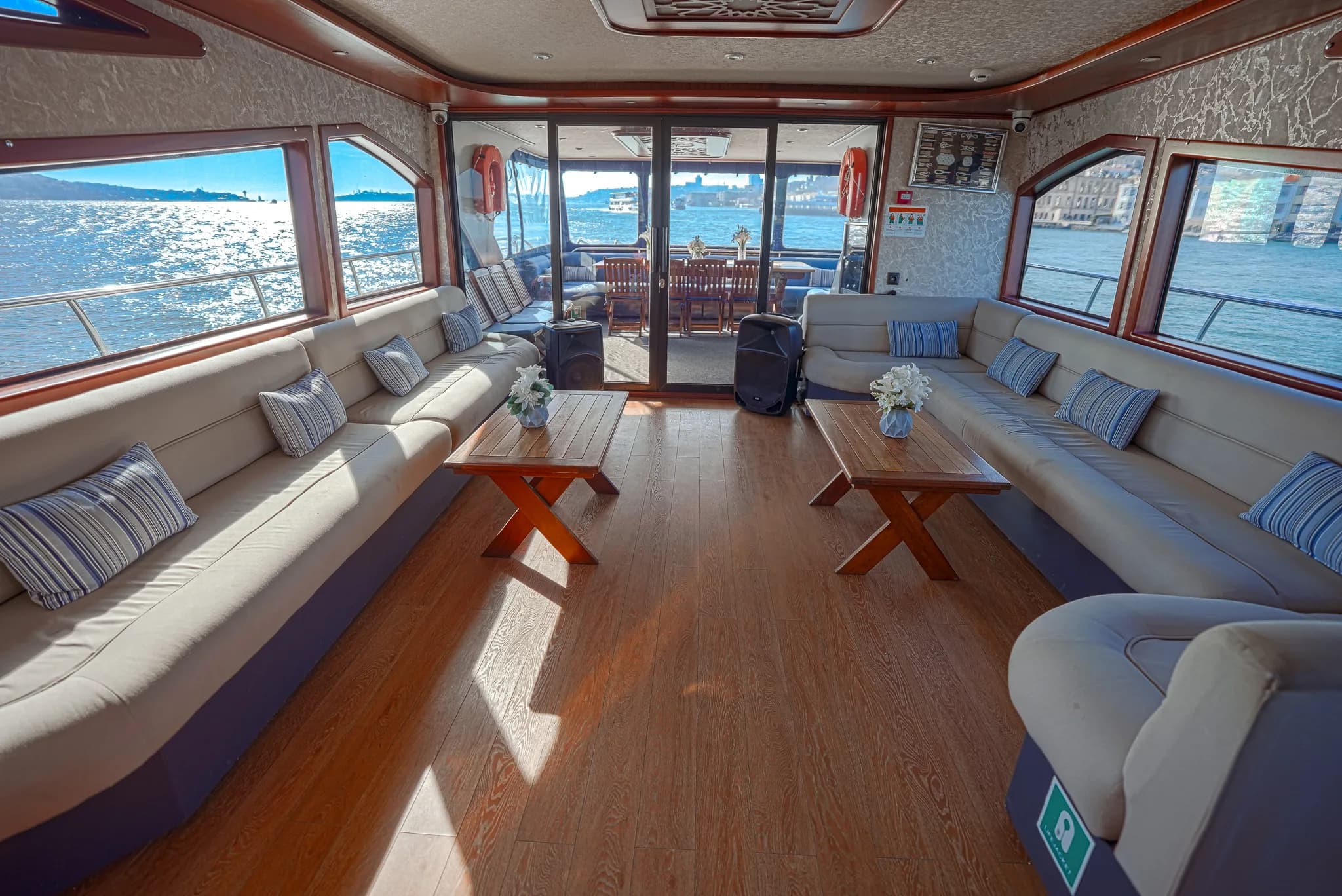 Main saloon with sofas and panoramic windows over the Bosphorus